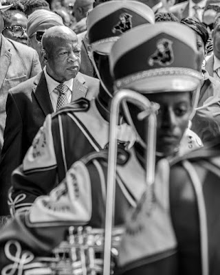 photo of John Lewis with marching band