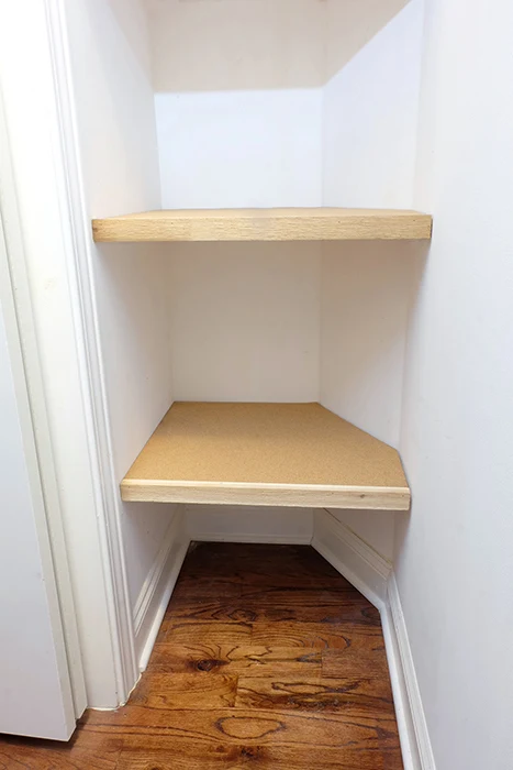 finished plywood and cork closet shelves