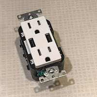 Duplex USB charger wall outlet out of the box