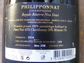 Details of the requirements to mention winemaker, location, vintage, sugar levels and professional reference code number on champagne labels. Photo taken by Susan from Loire Valley Time Travel.