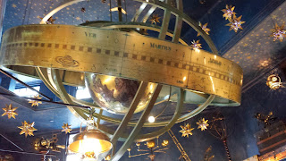 Large globe that fills a sizable ceiling area of Wiseacre's Universal Orlando