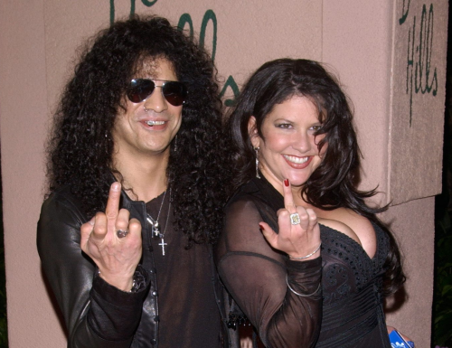 year we reported that Slash and his wife Perla Ferrar were splitting