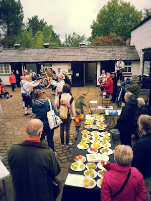 The Mersey Morris Men performing in the courtyard at Eastham Country Park