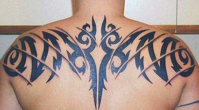 Black tribal upper back tattoo