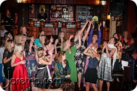 Bridal flower bouquet being caught by woman at Galagos