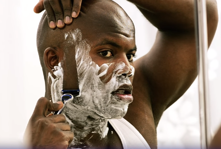 Man shaving beard