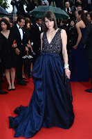 Milla Jovovich glamorous in a blue dress