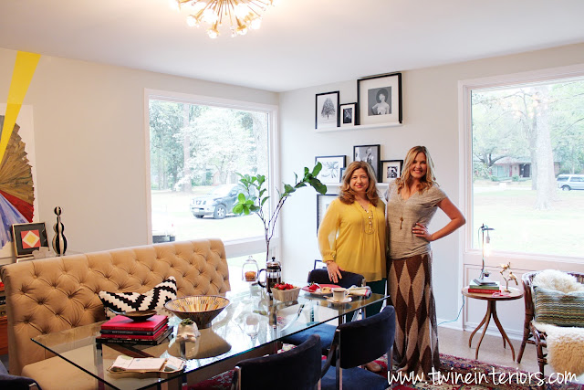 mid-century modern home, eclectic modern dining room, abstract art, banquette dining, glass dining table