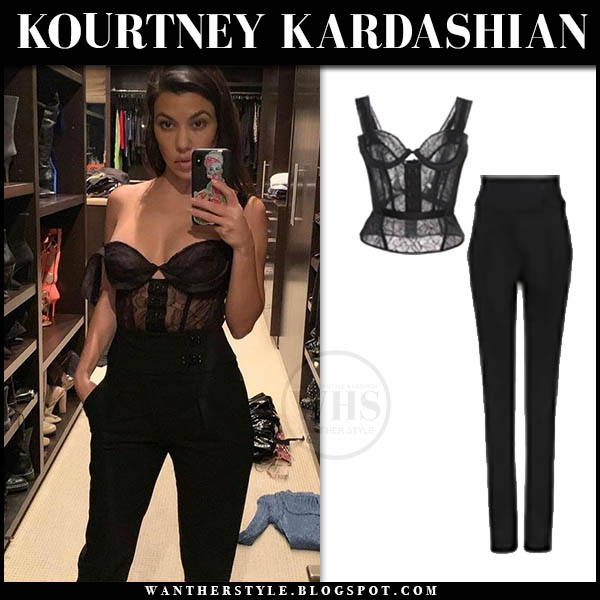 Kourtney Kardashian in black lace corset and black pants