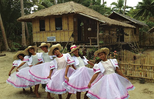 Sibaltan cultural dancers in front of the Balay Cuyonon Museum