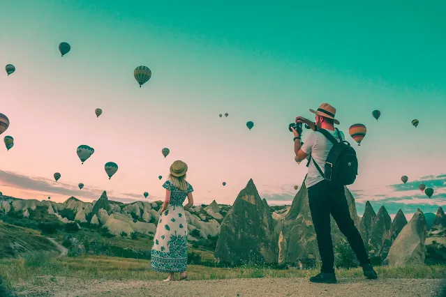 A view of air balloons on field