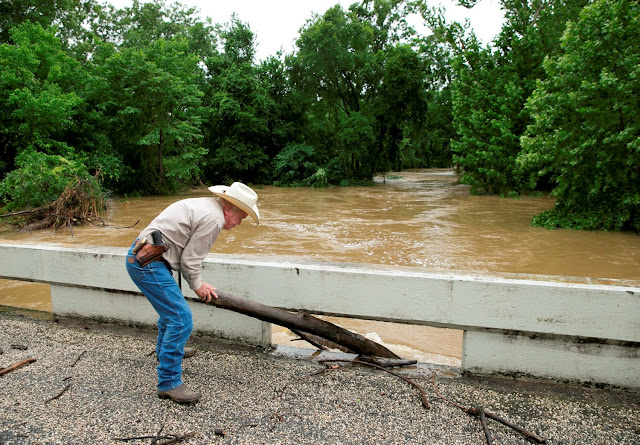 Texas floods: Two more bodies found as boy (11) who fell into swollen creek still missing