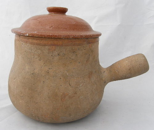 Large terracotta skillet pan and French clay pots from Vallauris