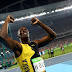 Usain Bolt sets new record as he wins Olympic 100m gold (Photos)