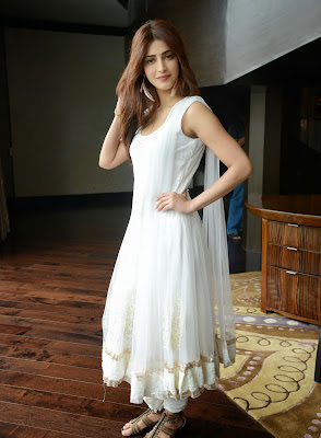 Shruti Haasan, Candid Photoshoot, bollywood actress, Indian Actress, Shruti Haasan Showcasing Her Stunning Figure In White Dress