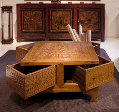 oak coffee table with drawers swung out