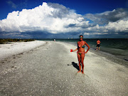 A beach walk with Adam to the Sanibel Lighthouse. (lighthouse beach )