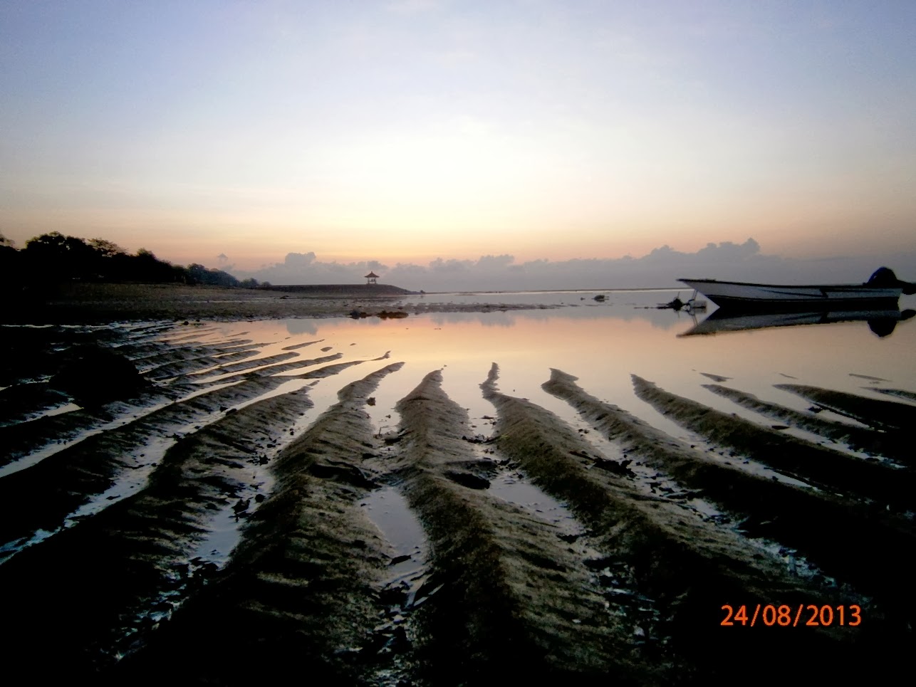 Beautiful sunrise in Mertasari Beach Bali Haya zone