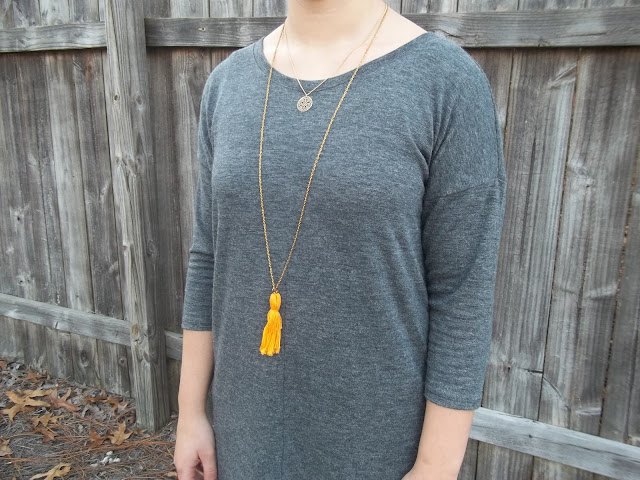 grey knit cocoon dress orange tassel necklace simple necklace filigree black ankle booties outfit dressember dress donate human trafficking