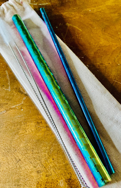 rainbow reusable straws on fabric bag