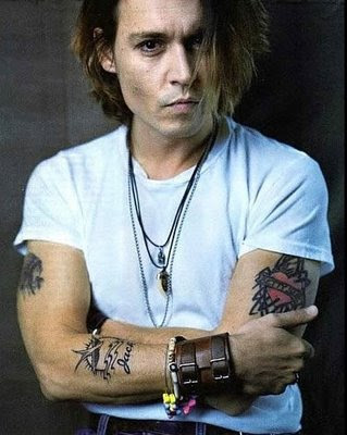 johnny depp tattoos skull and crossbones. Johnny Depp and his tattoo