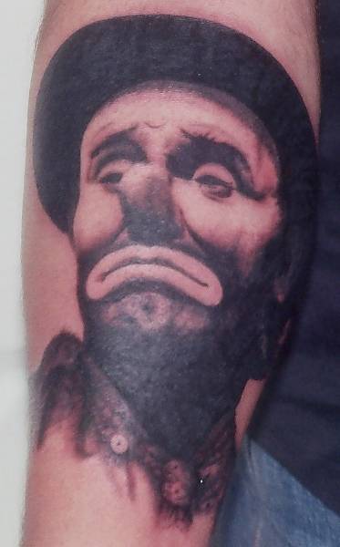 The most popular area for a clown tattoo seems to be the upper arm and lower 