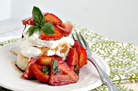 Soft, moist homemade shortcakes are topped with a sweet & tangy strawberry basil topping in these perfect for summer Strawberry Basil Sour Cream Shortcakes.