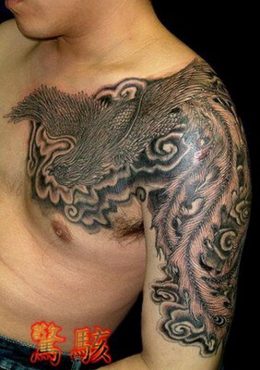The large designs for rib cage tattoos are usually dark aggressive and bold