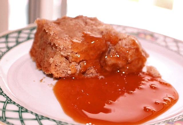 butterscotch sauce oozing out of warm cake
