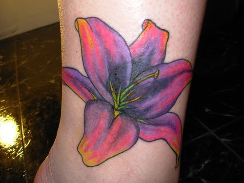 Flower tattoos are great for the fact that you can make them small and 