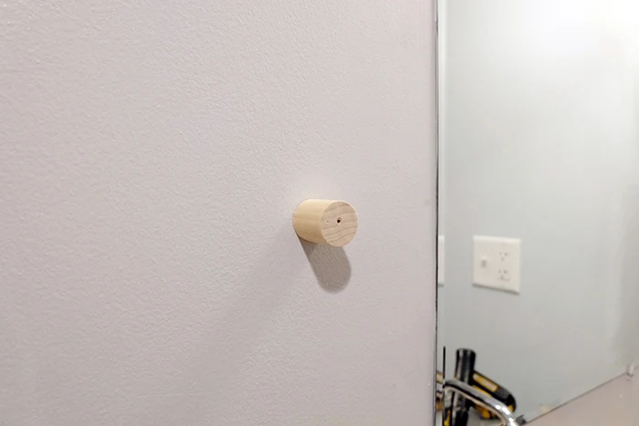 dowel screwed into wall