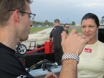 Lotus Dragon Racing teammates Sebastien Bourdais and Katherine Legge compare