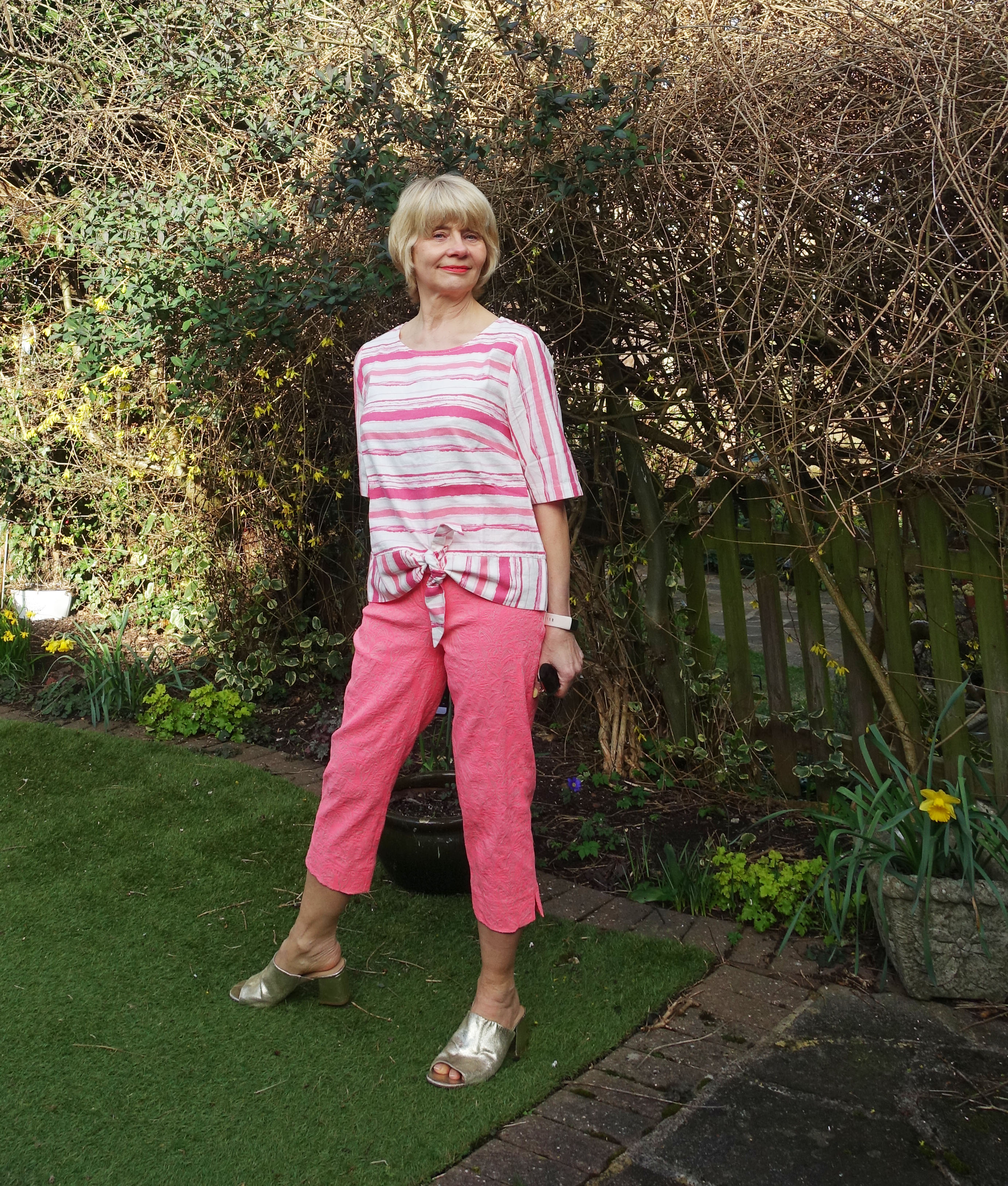 A linen tie waist top that doesn't crumpled: a must-have for your summer holiday in 2023! Flamingo top by Cotton Traders worn by Gail Hanlon from Is This Mutton