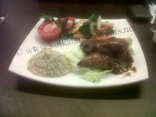 Grilled Chicken with mushroom sauce continental dishes in Golpark Gariahat South Kolkata