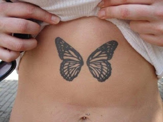 butterfly tattoo on stomach