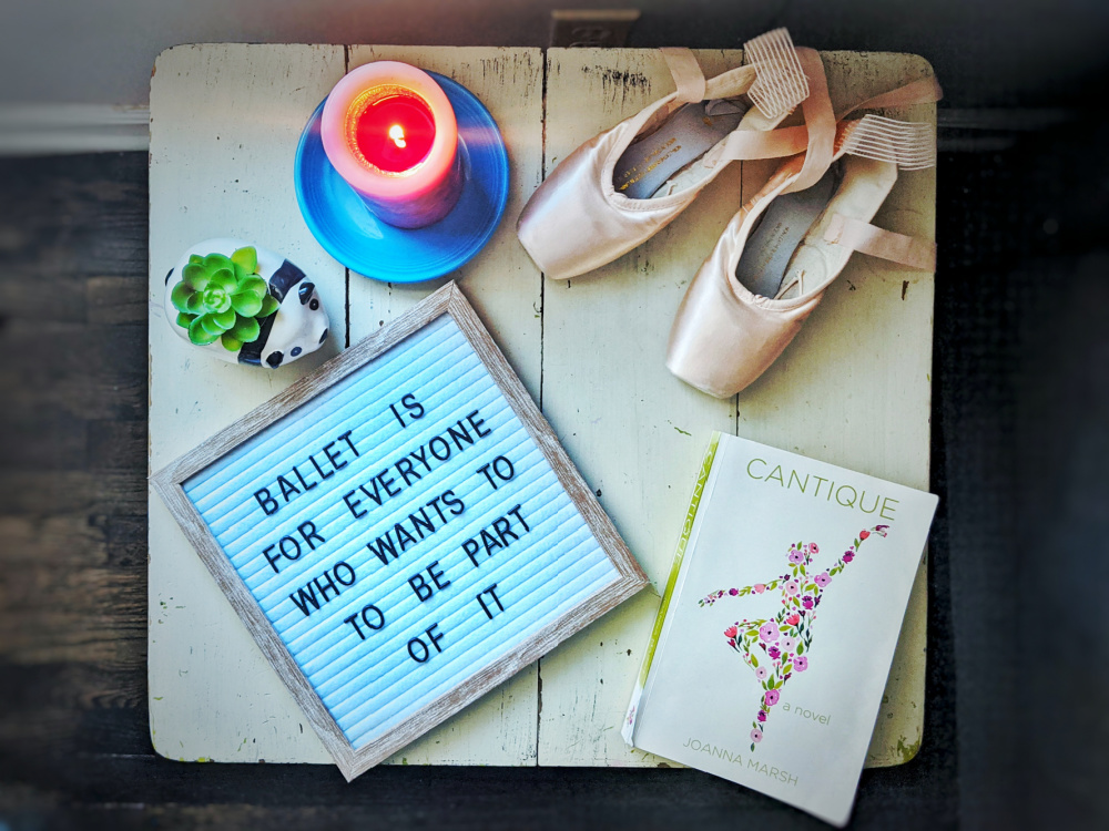 Letterboard that reads: Ballet is for everyone who wants to take part in it, and the novel Cantique by Joanna Marsh