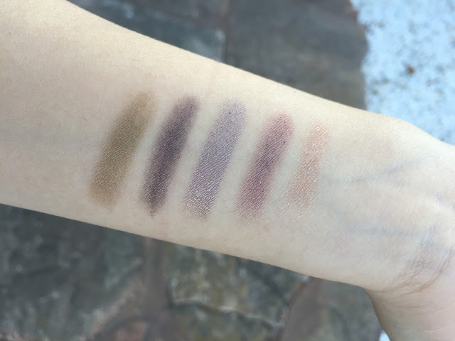 Photo of 100% Pure Eye Creamstick swatches.