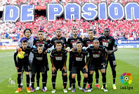 GRANADA C. F. - Granada, España - Temporada 2016-17 - Ochoa, Ezequiel Ponce, Vezo, Lombán, Andreas Pereira y Victorien Angban; Isaac Cuenca, Tito, Alberto Bueno, Javi Márquez y Gabriel Silva - ATLÉTICO DE MADRID 7 (Yannick Carrasco 3, Gaitán 2, Ángel Correa y Tiago) GRANADA C. F. 1 (Cuenca) - 15/10/2016 - Liga de 1ª División, jornada 8 - Madrid, estadio Vicente Calderón - El Granada se adelantó en el marcador con un gran gol de Isaac Cuenca, para luego caer derrotado estrepitosamente