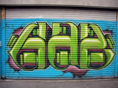 Graffiti Alphabet at The Door of The Shop
