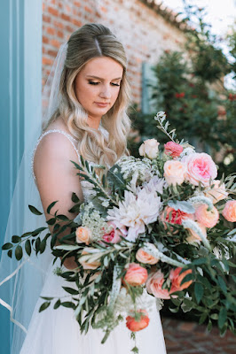 bride with big colorful bouquet