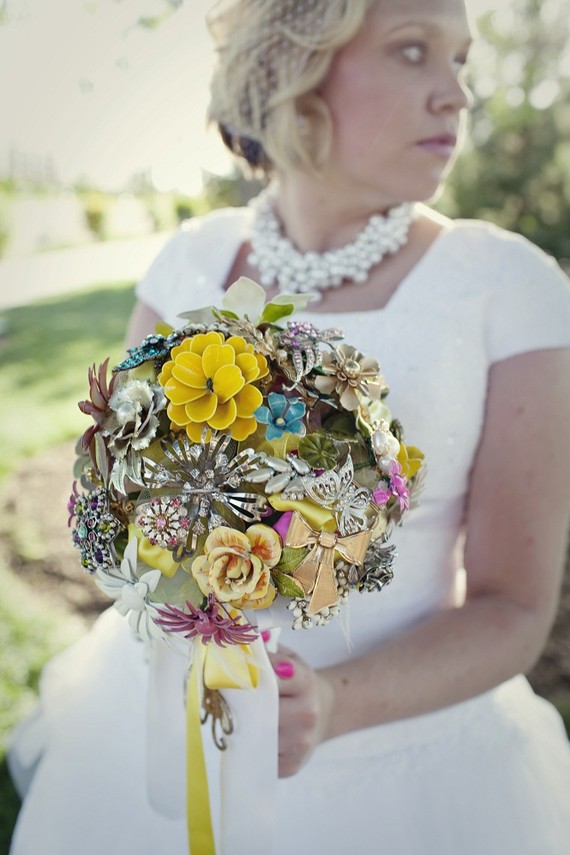 There is a great brooch bouquet DIY found at Fancy Pants Weddings