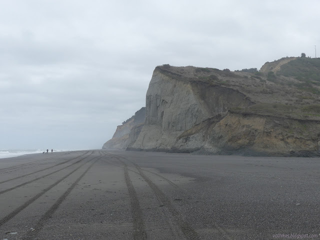 high cliffs beside the wide beach