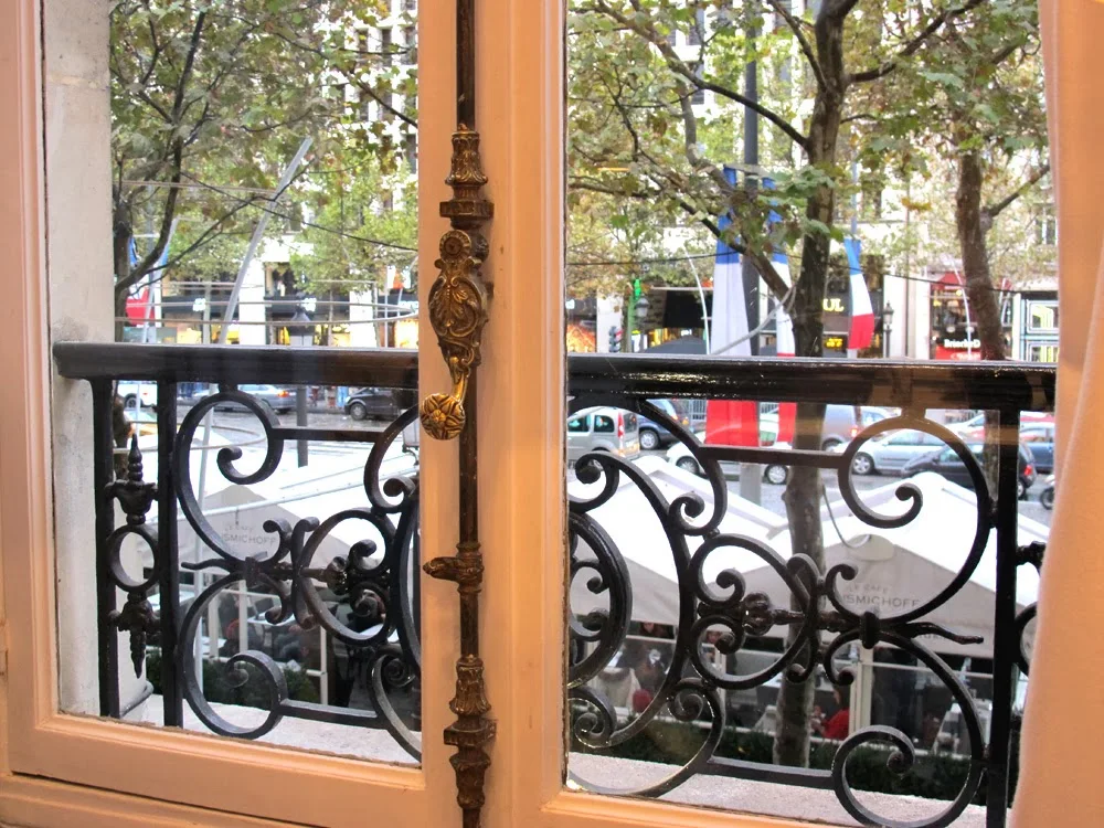 Café Kousmichoff view of the Champs Elysee in Paris