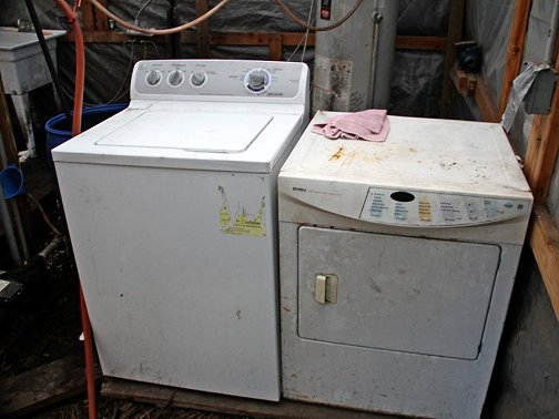 Kitchen With Washer And Dryer