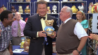 30 Rock screen shot of Alec Baldwin holding a cookie jar