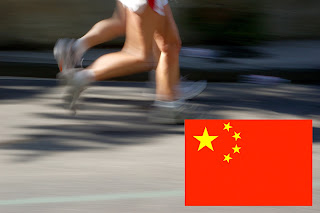 Photo of runners with Chinese flag