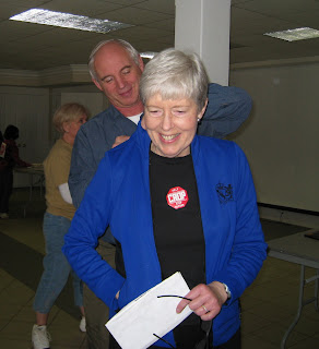 Mary Ellen O'Connor Shyne having her CROP sign pinned on