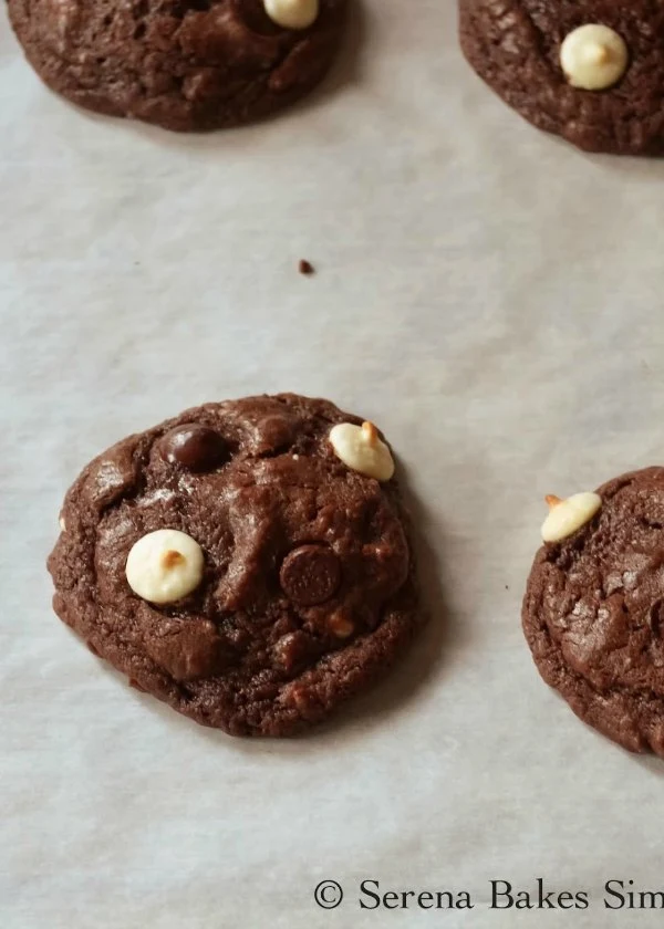 Soft chewy Double Chocolate Chip Cookies filled with white and semi sweet chocolate in a chocolaty cookie from Serena Bakes Simply From Scratch.