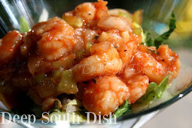 A spicy marinade of chili sauce, hot sauce, citrus vodka, horseradish, celery, garlic, sweet onion, and Cajun seasoning, tossed with shrimp for a fantastic appetizer.