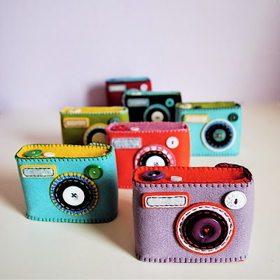 http://petapixel.com/2010/09/30/cute-hand-stitched-felt-camera-cases/